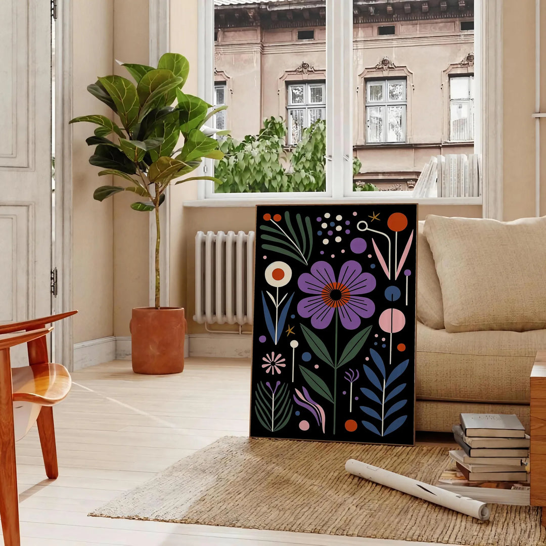 Delicate botanical flowers in a black and green color palette - in a Parisian living room with a sofa and a fig plant