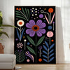 Delicate botanical flowers in a black and green color palette - in a bright minimalist room with a plant and an armchair