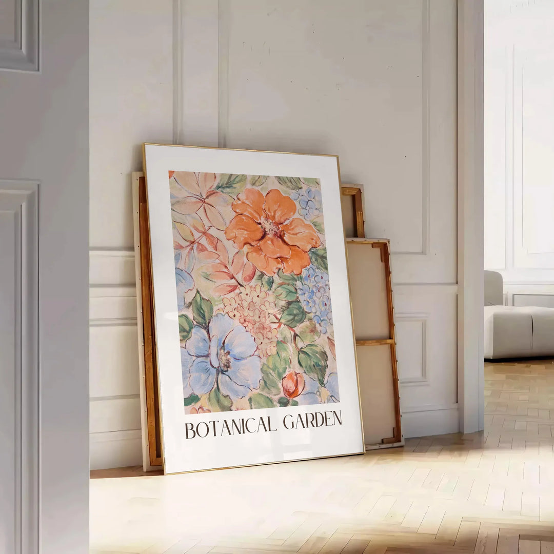 Botanical illustration featuring green leaves and orange flowers - leaning on a herringbone floor against a white panelled wall