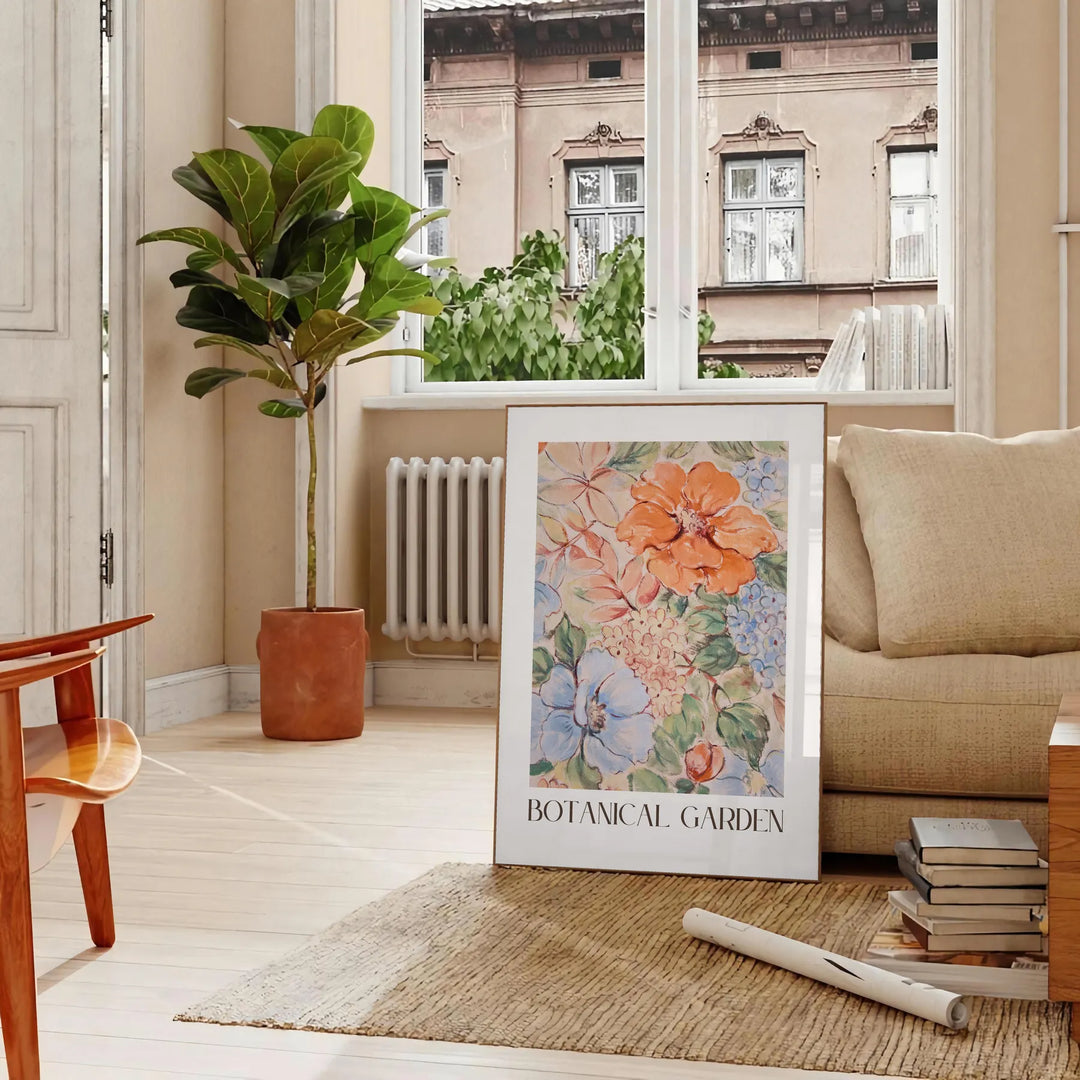 Botanical illustration featuring green leaves and orange flowers - in a Parisian living room with a sofa and a fig plant