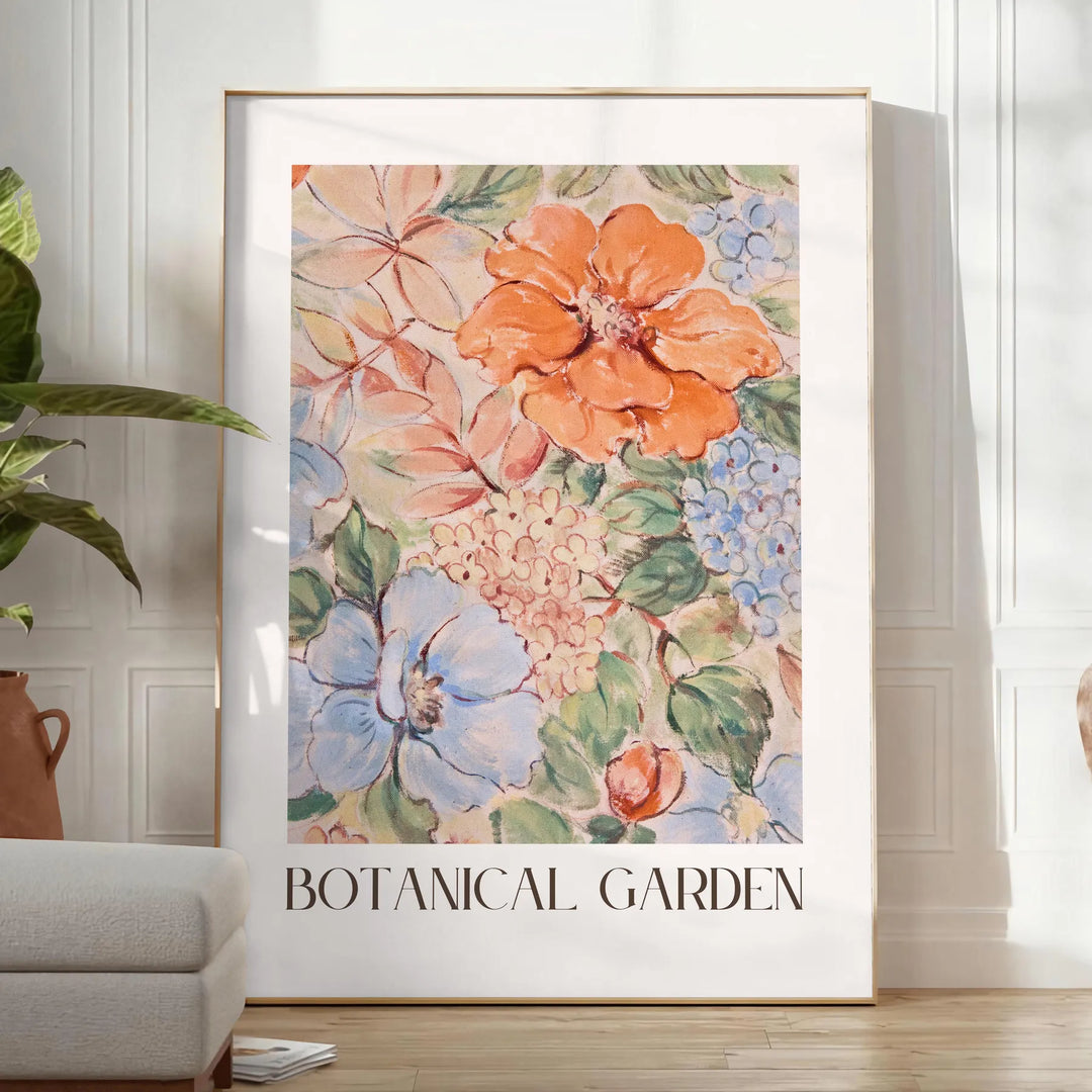 Botanical illustration featuring green leaves and orange flowers - in a bright minimalist room with a plant and an armchair