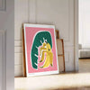 Lush green botanical illustration with vivid orange accents - leaning on a herringbone floor against a white panelled wall
