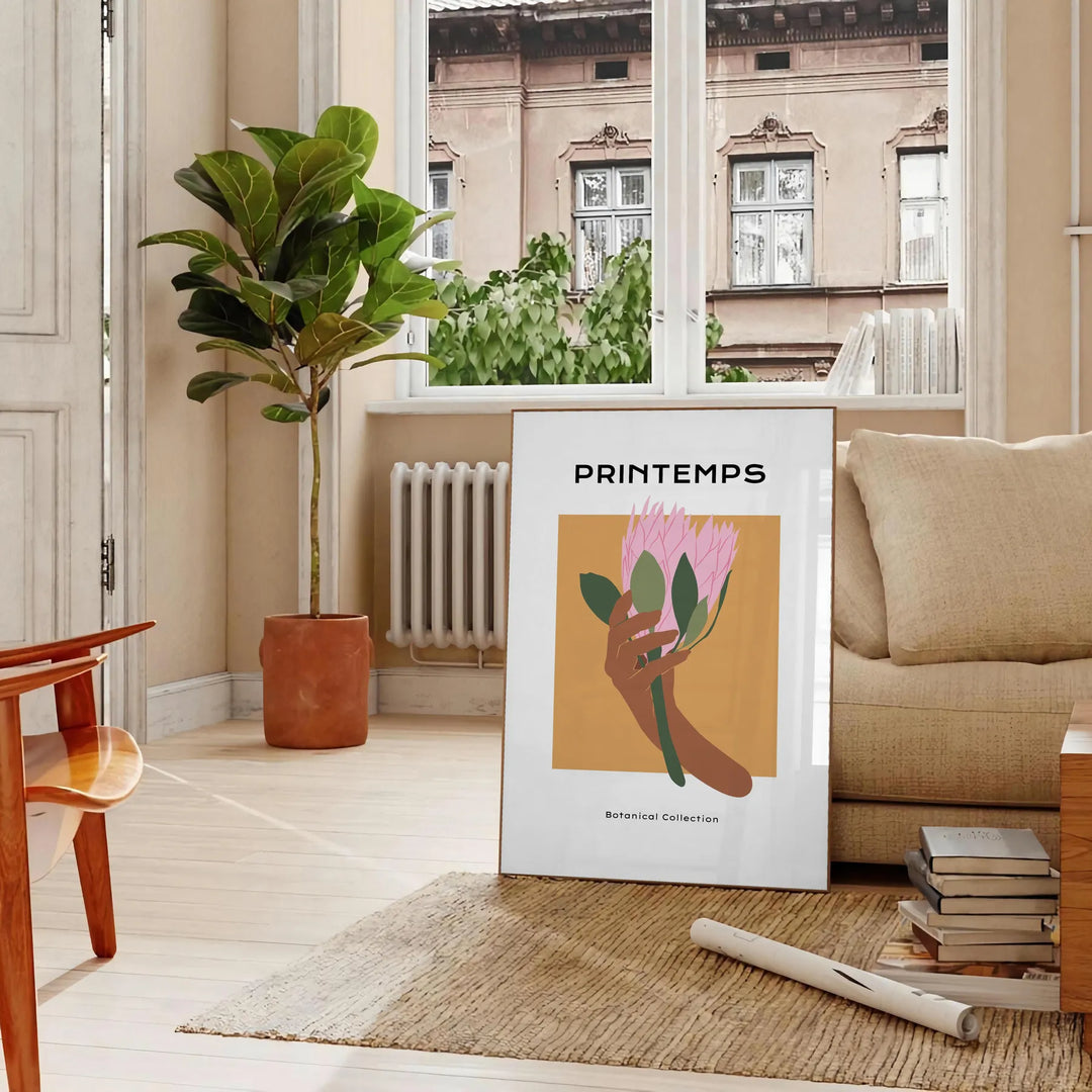Botanical illustration featuring lush green leaves and vibrant orange flowers - in a Parisian living room with a sofa and a fig plant