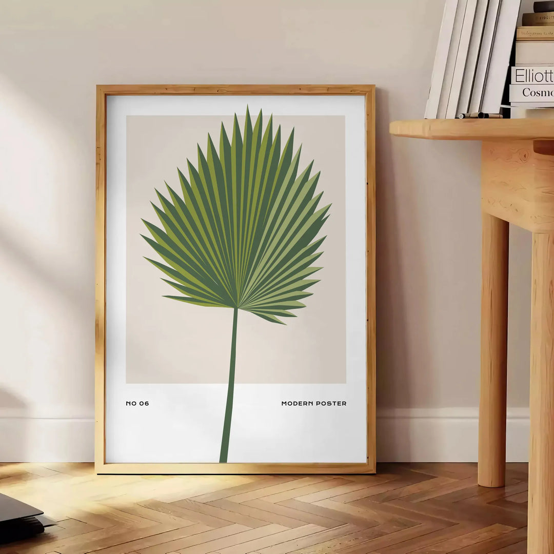 Vintage botanical illustration featuring orange and gray tones with detailed plant designs - beside a round wooden side table with books