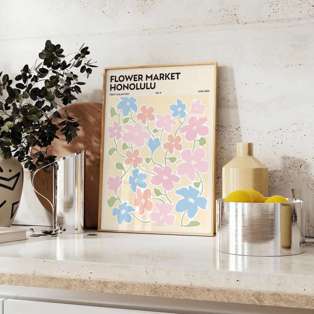 Black and white botanical illustration featuring detailed plant leaves - styled on a counter with eucalyptus and a bowl of lemons