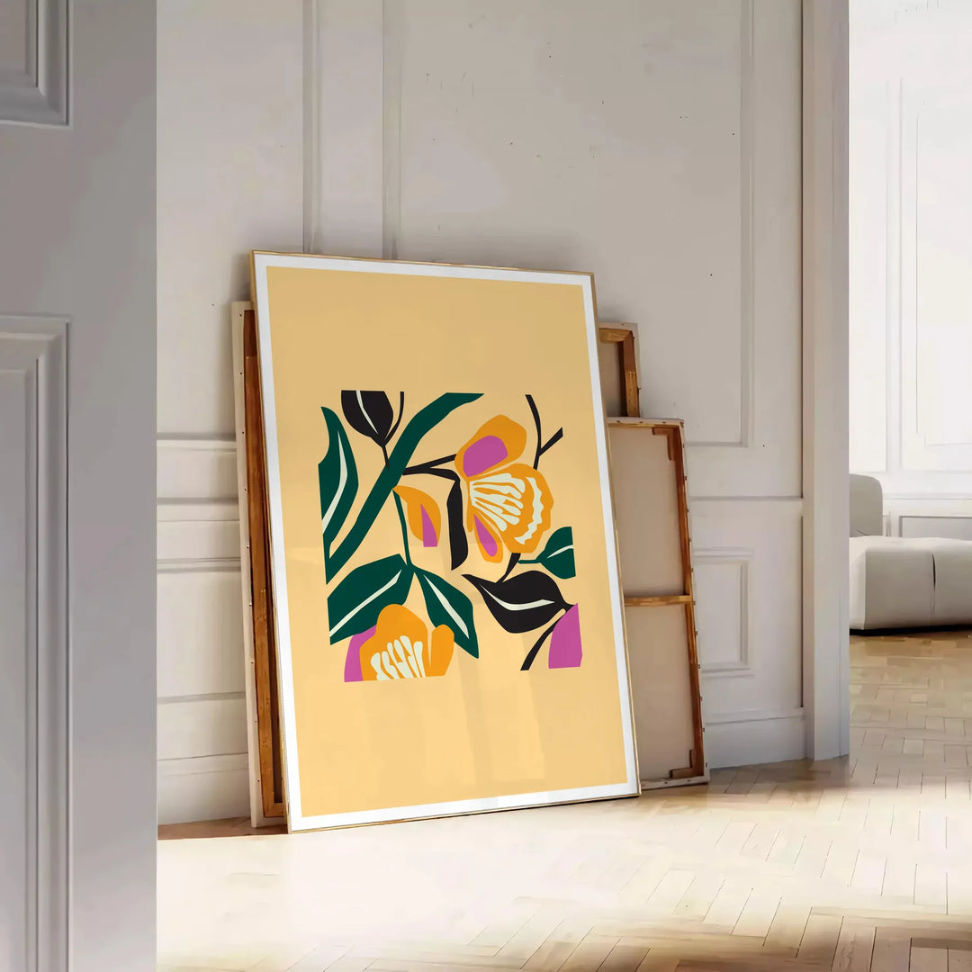 Botanical print featuring yellow flowers with bold black details - leaning on a herringbone floor against a white panelled wall