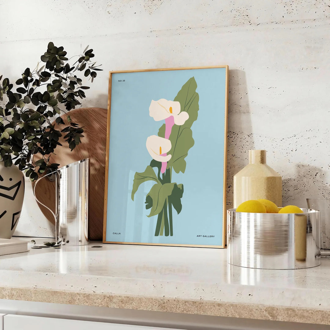 Vintage botanical illustration featuring blue and gray plant motifs - styled on a counter with eucalyptus and a bowl of lemons