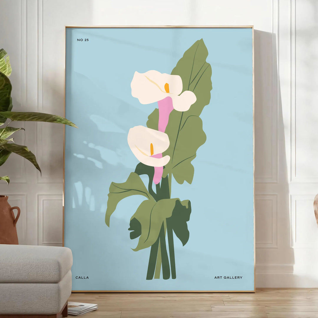 Vintage botanical illustration featuring blue and gray plant motifs - in a bright minimalist room with a plant and an armchair