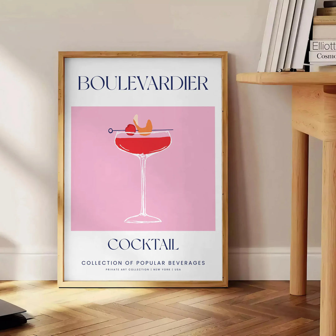 Illustration of a Boulevardier cocktail with orange and blue accents - beside a round wooden side table with books