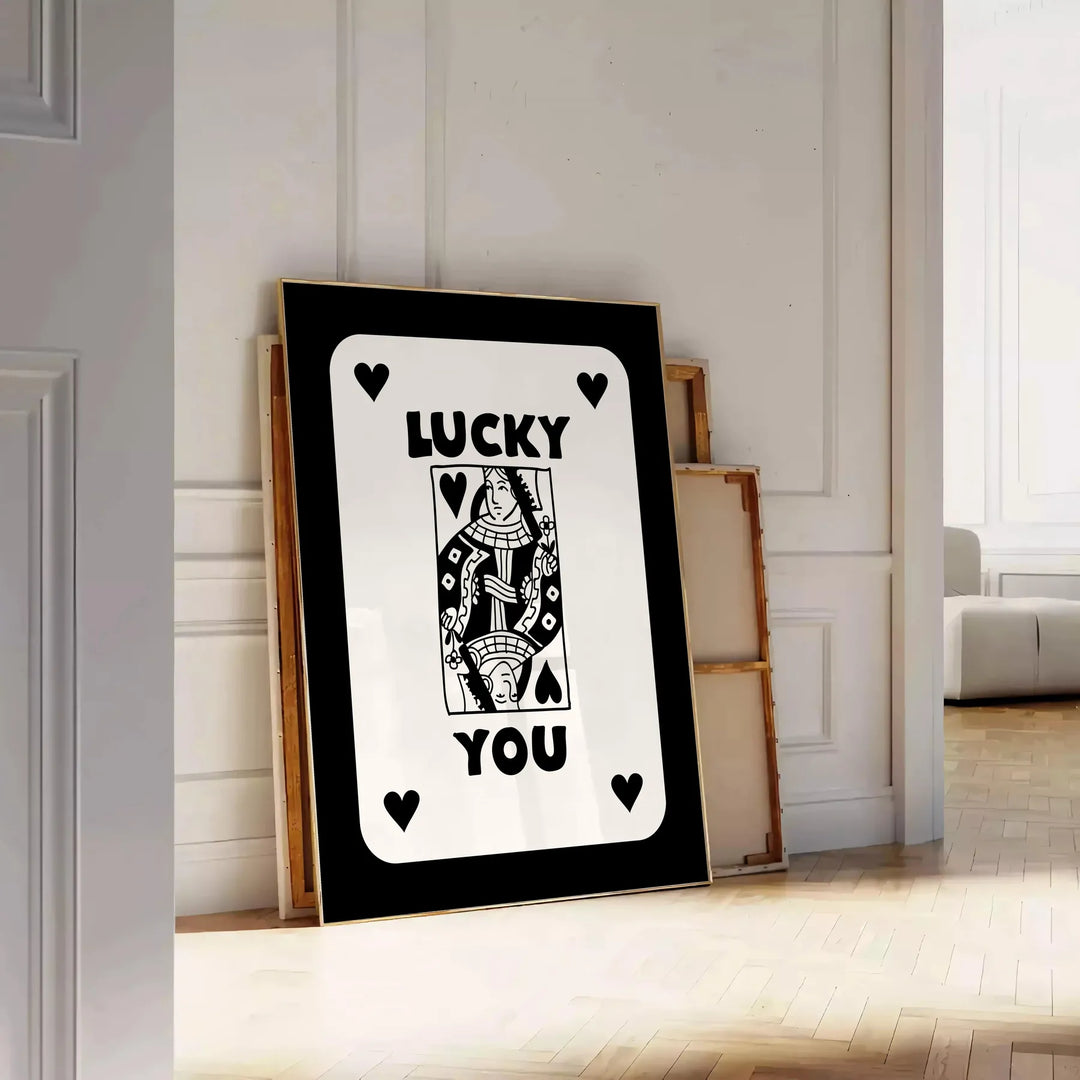 Abstract card design with sleek gray and black tones - leaning on a herringbone floor against a white panelled wall