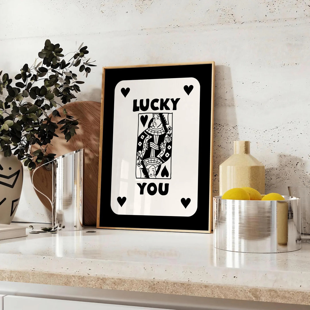 Abstract card design with sleek gray and black tones - styled on a counter with eucalyptus and a bowl of lemons