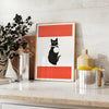 A stylized black and orange cat silhouette against a textured background - styled on a counter with eucalyptus and a bowl of lemons