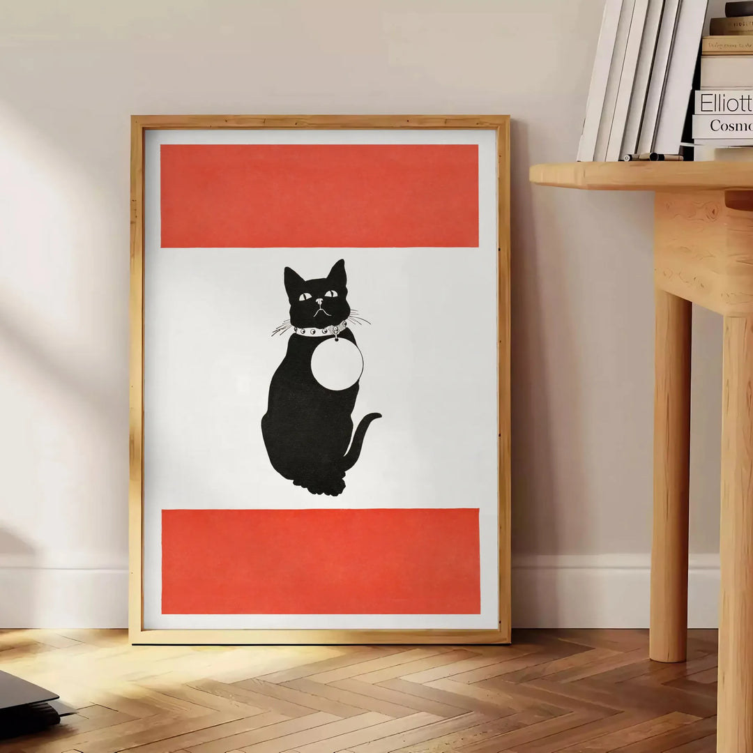 A stylized black and orange cat silhouette against a textured background - beside a round wooden side table with books