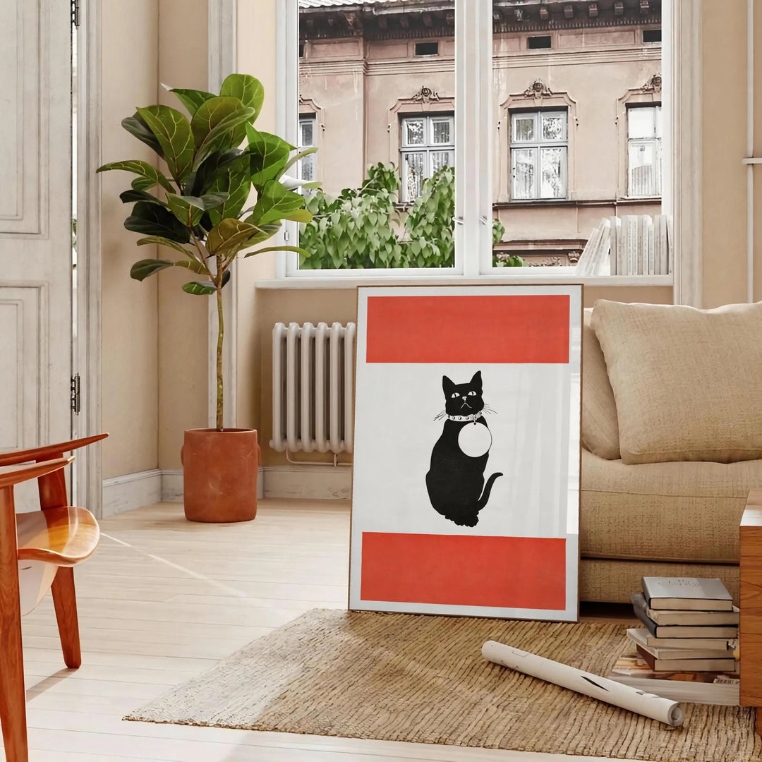 A stylized black and orange cat silhouette against a textured background - in a Parisian living room with a sofa and a fig plant