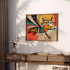 A whimsical cat in space, featuring green and orange colors - styled on a counter with eucalyptus and a bowl of lemons