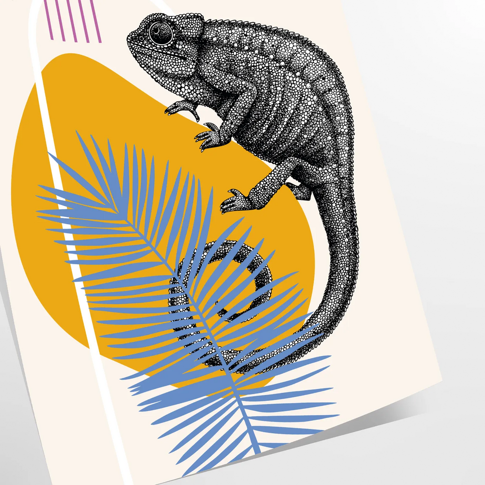 A chameleon blending into a gray background with orange accents, showcasing adaptability.