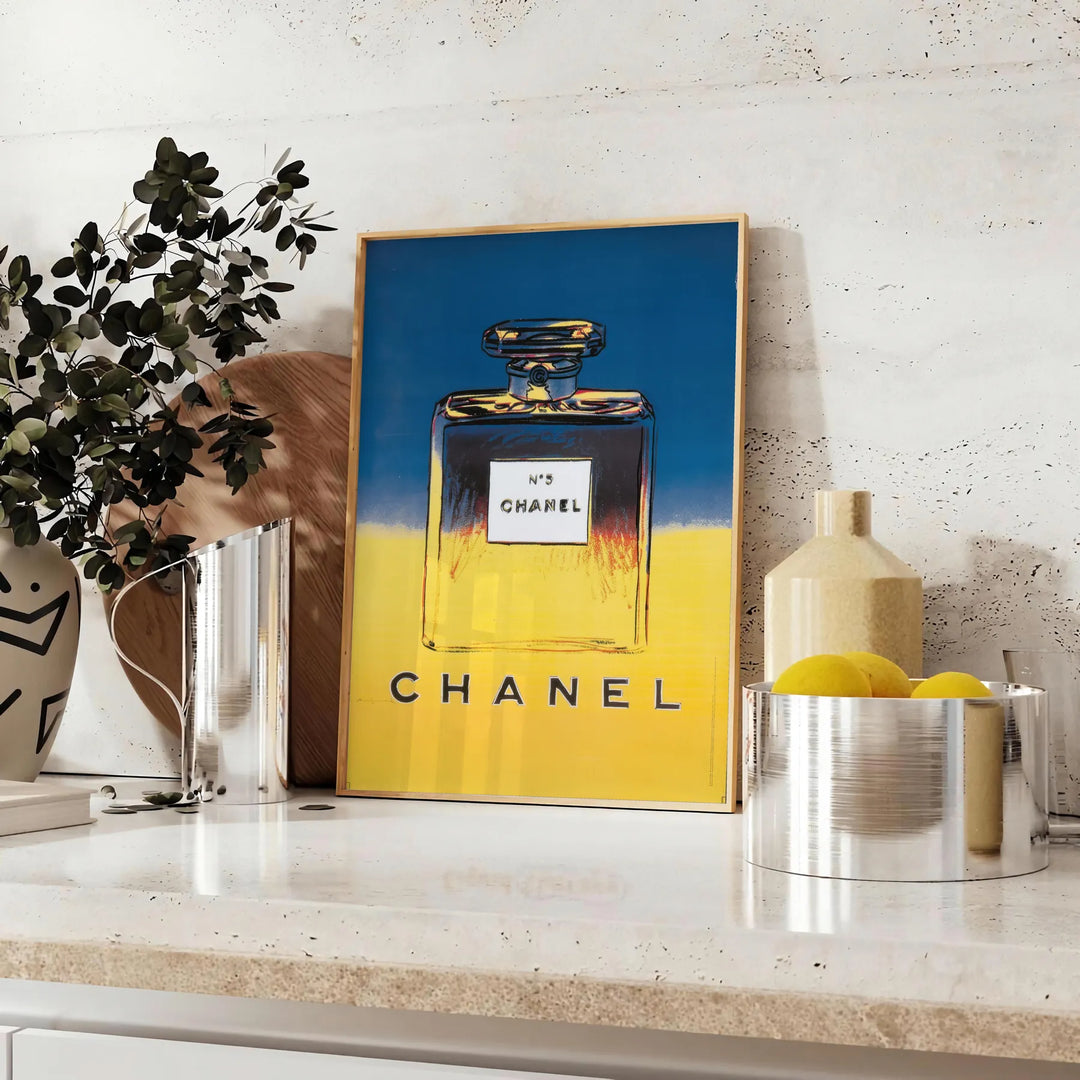 Chanel Pub Poster featuring a stylish design in gray and blue tones - styled on a counter with eucalyptus and a bowl of lemons