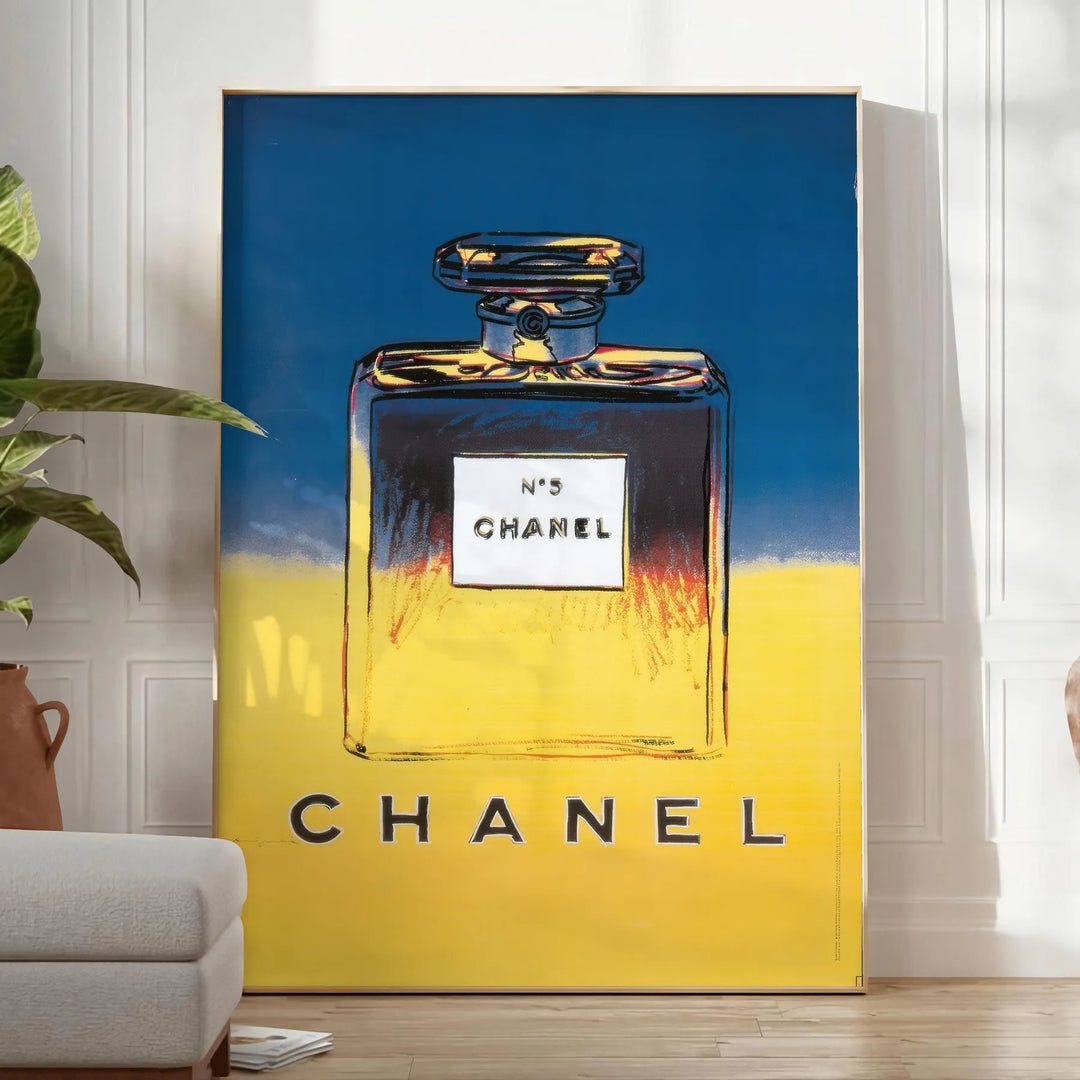 Chanel Pub Poster featuring a stylish design in gray and blue tones - in a bright minimalist room with a plant and an armchair