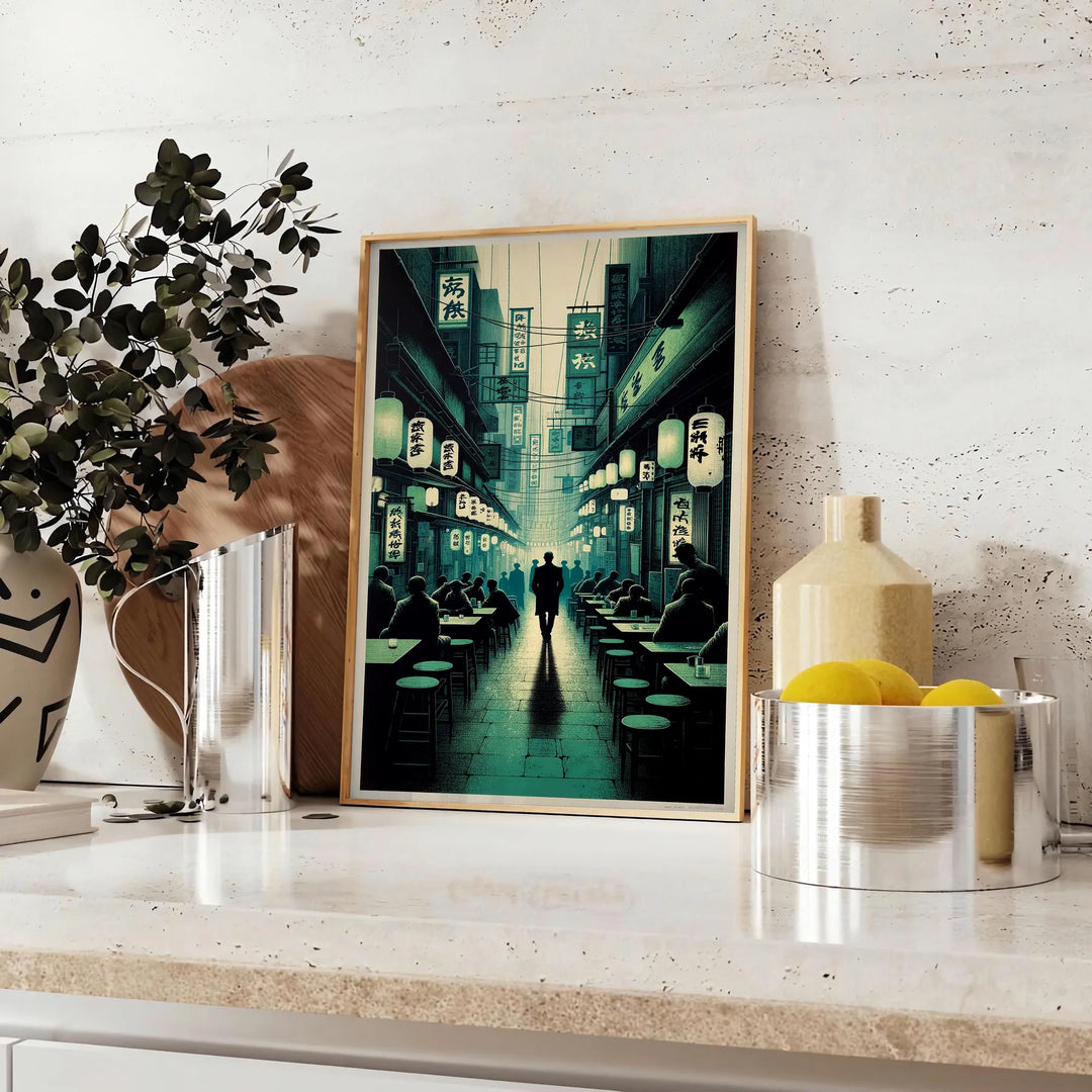 Abstract depiction of a cityscape in Japan with black and gray tones - styled on a counter with eucalyptus and a bowl of lemons