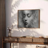 A whimsical illustration of a child floating among fluffy clouds in soft greens and grays - styled on a counter with eucalyptus and a bowl of lemons