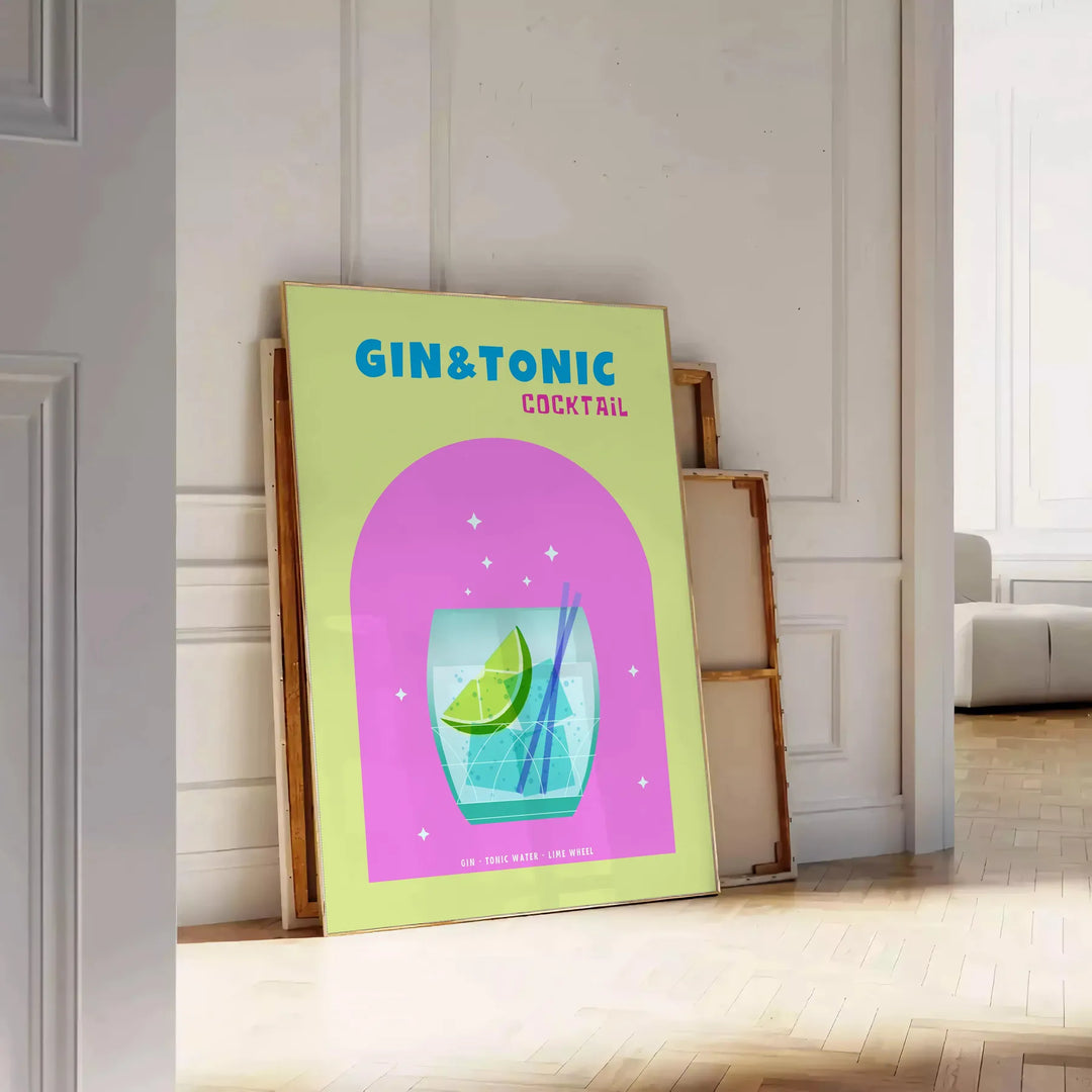 A gin and tonic cocktail in a glass with green and blue hues - leaning on a herringbone floor against a white panelled wall