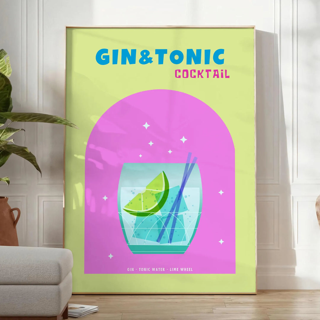A gin and tonic cocktail in a glass with green and blue hues - in a bright minimalist room with a plant and an armchair