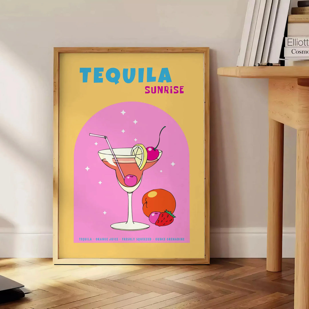 illustrazione di un cocktail Tequila Sunrise con sfumature di arancione e giallo - accanto a un tavolino rotondo in legno con libri