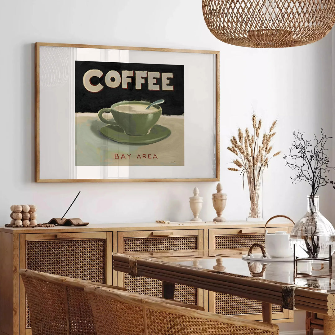 A kitchen scene featuring coffee cups and beans in green and orange tones - in a Parisian living room with a sofa and a fig plant