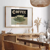 A kitchen scene featuring coffee cups and beans in green and orange tones - in a Parisian living room with a sofa and a fig plant