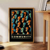 Abstract depiction of a community dance in yellow and black tones - beside a round wooden side table with books
