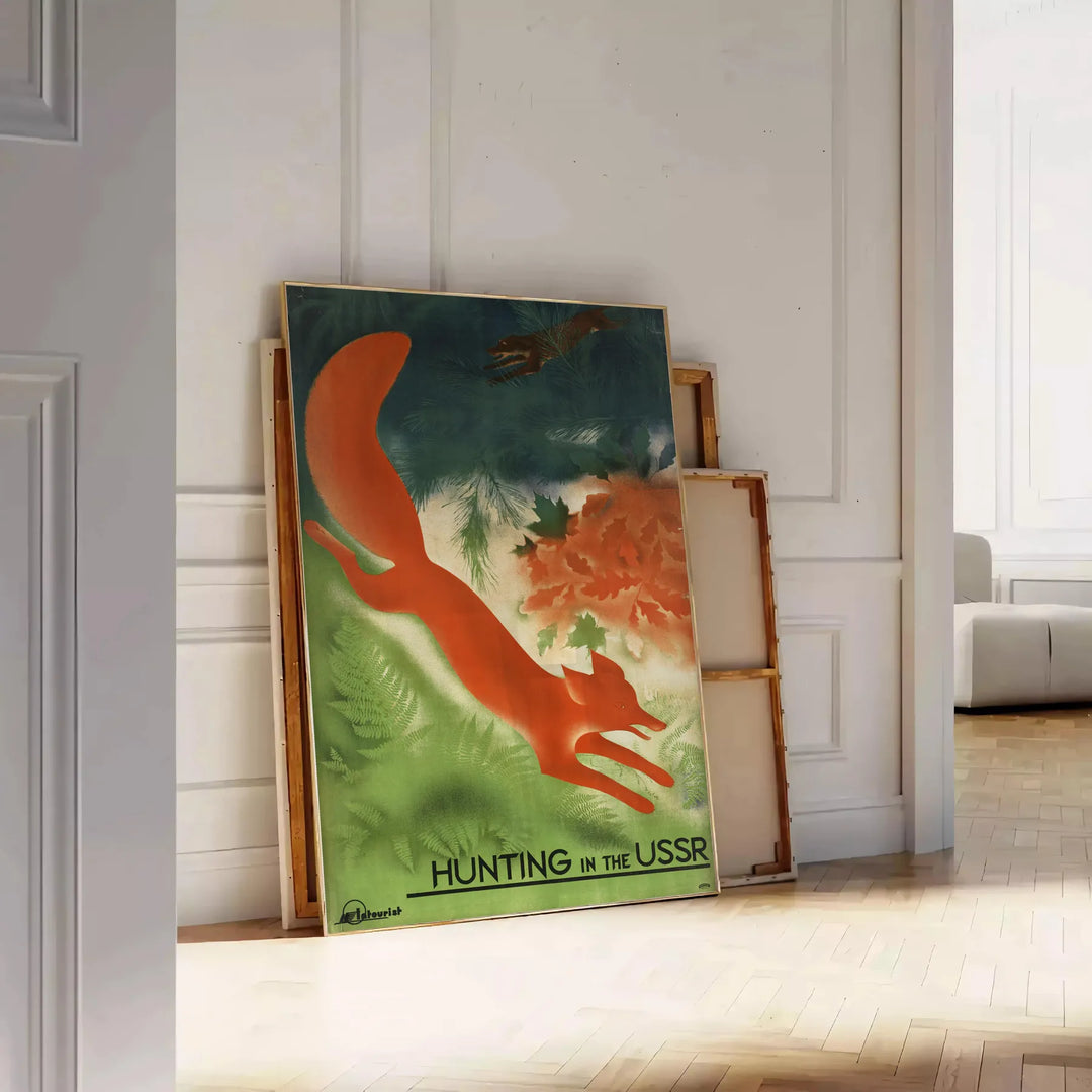 A vintage travel poster featuring communist themes in gray and brown tones - leaning on a herringbone floor against a white panelled wall