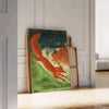 A vintage travel poster featuring communist themes in gray and brown tones - leaning on a herringbone floor against a white panelled wall