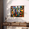 Cubist artwork featuring abstract shapes in green and blue tones - styled on a counter with eucalyptus and a bowl of lemons