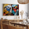 Cubist composition featuring geometric shapes in green and blue tones - in a Parisian living room with a sofa and a fig plant