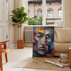 Cubist artwork featuring geometric shapes in shades of green and blue - in a Parisian living room with a sofa and a fig plant