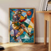 Cubist artwork featuring abstract shapes in shades of gray and green - beside a round wooden side table with books