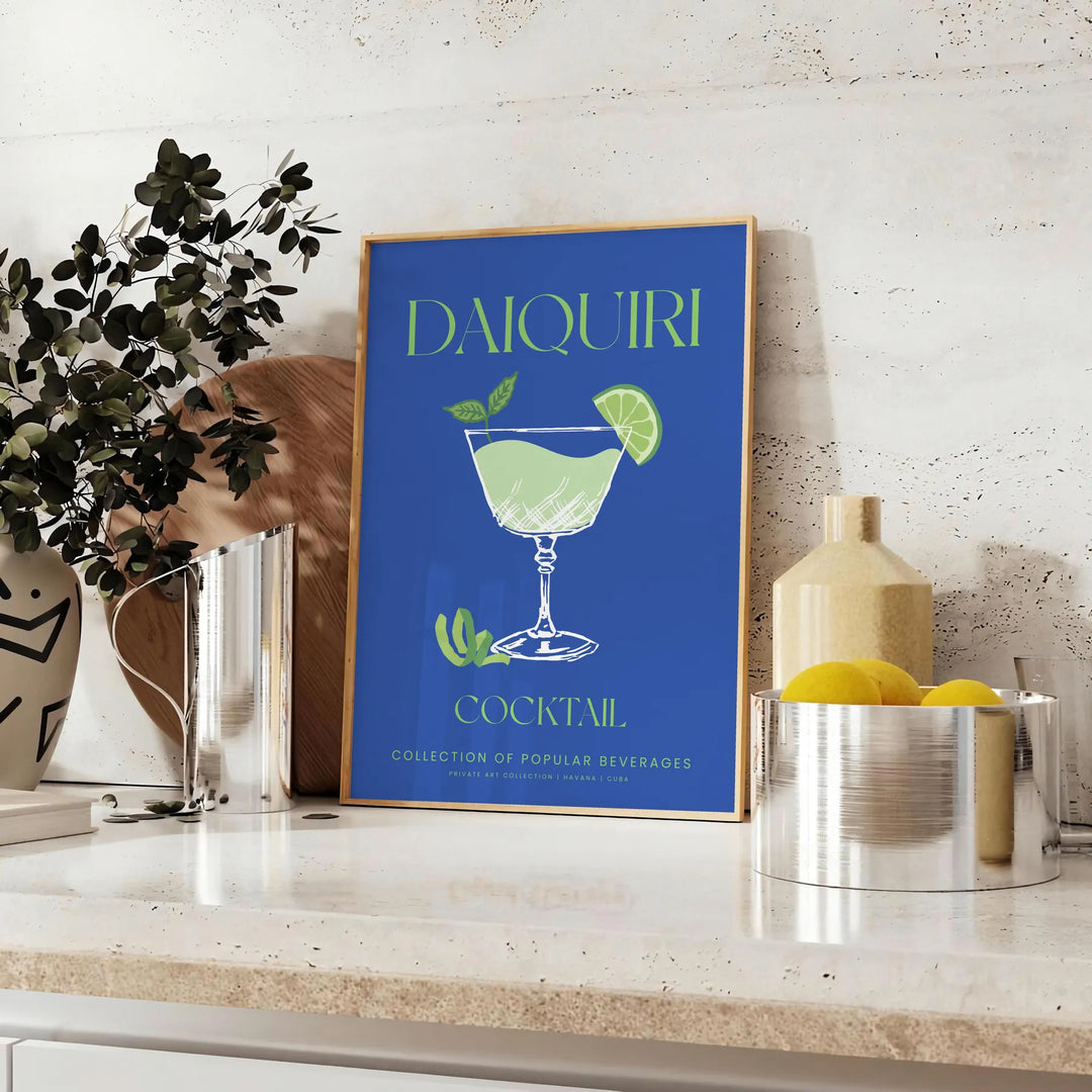 Illustration of a daiquiri cocktail in green and blue tones - styled on a counter with eucalyptus and a bowl of lemons