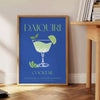 Illustration of a daiquiri cocktail in green and blue tones - beside a round wooden side table with books
