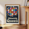 A retro-inspired poster featuring a dancing figure in orange and black hues - beside a round wooden side table with books