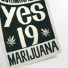 Vintage poster featuring bold black and orange design advocating marijuana decriminalization - as a rolled, unframed print