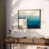 Abstract deep blue artwork with fluid shapes and soft white accents - styled on a counter with eucalyptus and a bowl of lemons