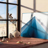 A deep blue abstract design with soft gray tones - leaning on a herringbone floor against a white panelled wall