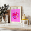 Abstract design featuring dice in purple and black hues - styled on a counter with eucalyptus and a bowl of lemons