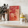 Abstract disco-themed artwork featuring brown and orange hues - styled on a counter with eucalyptus and a bowl of lemons