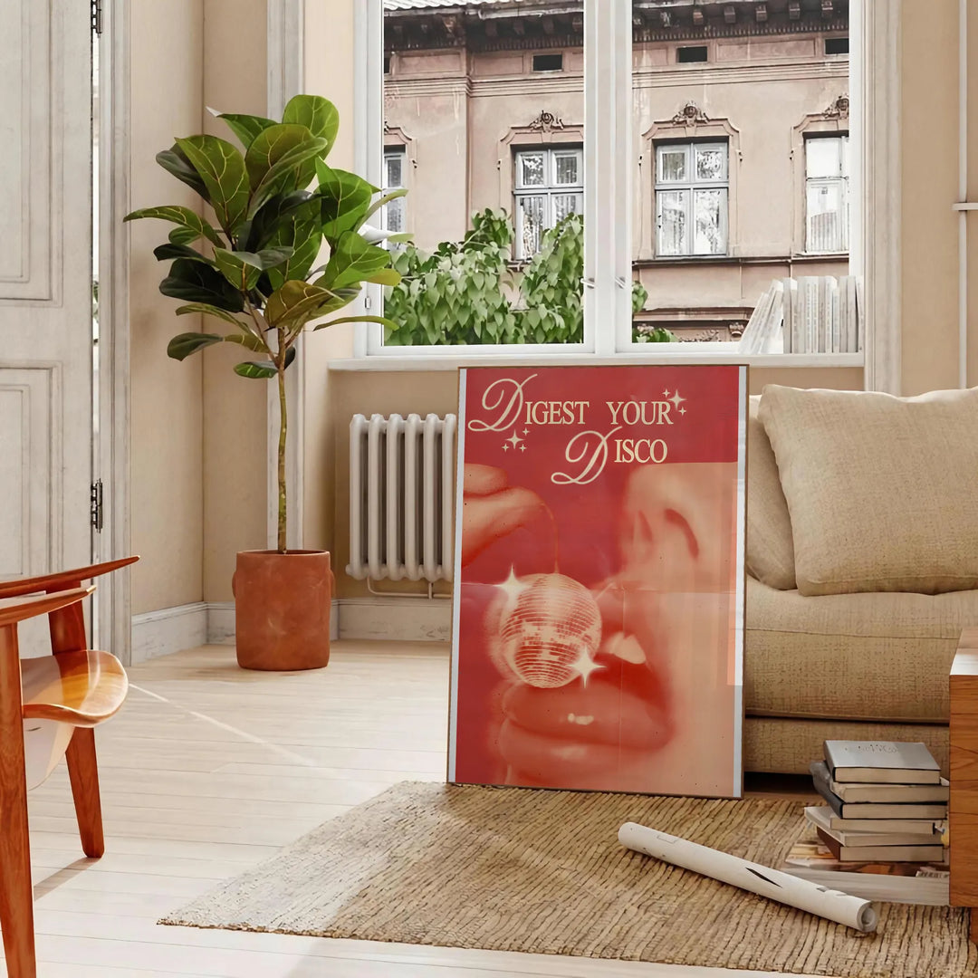 Abstract disco-themed artwork featuring brown and orange hues - in a Parisian living room with a sofa and a fig plant