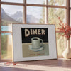 A retro diner scene with black and orange colors, featuring a classic kitchen setup - beside a round wooden side table with books