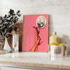 A retro-style illustration of a disco foot in bold black and orange hues - styled on a counter with eucalyptus and a bowl of lemons