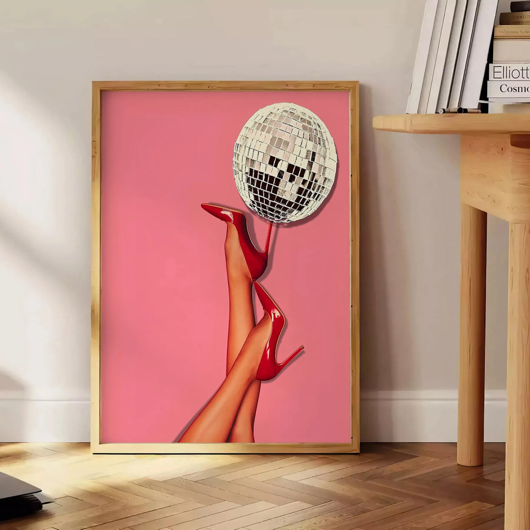 A retro-style illustration of a disco foot in bold black and orange hues - beside a round wooden side table with books