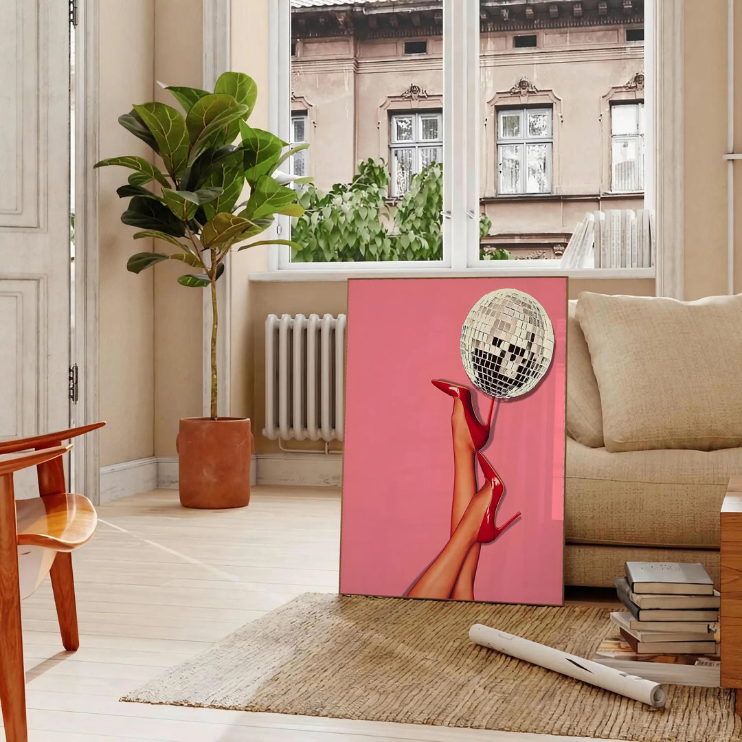 A retro-style illustration of a disco foot in bold black and orange hues - in a Parisian living room with a sofa and a fig plant