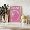 Abstract design featuring dynamic pink and orange shades reminiscent of disco themes - styled on a counter with eucalyptus and a bowl of lemons